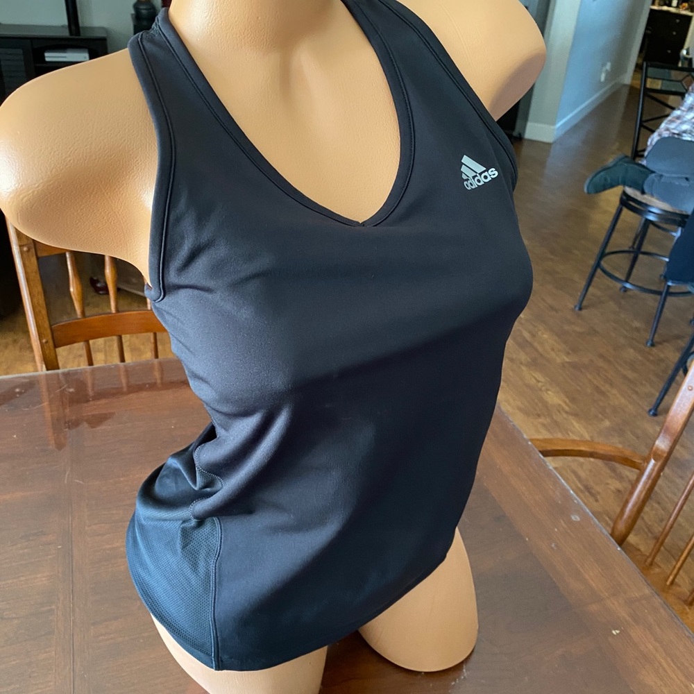 Adidas racerback sports tank top with cut out.